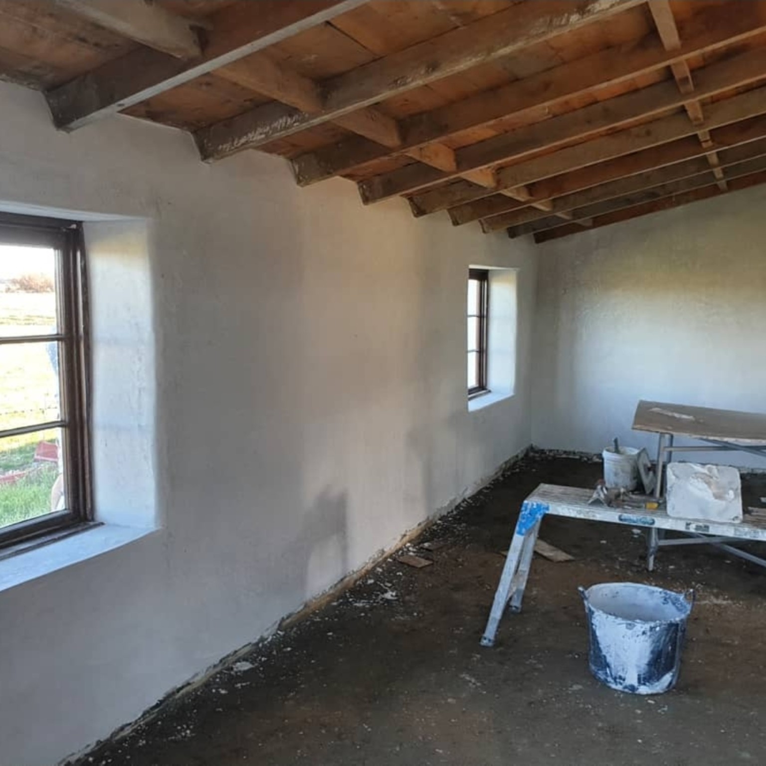 Room with newly plastered walls