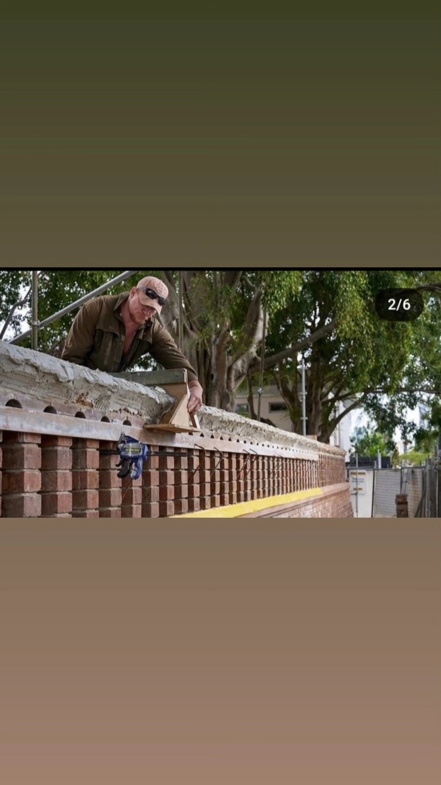 Traditional running mould work on a heritage brick wall