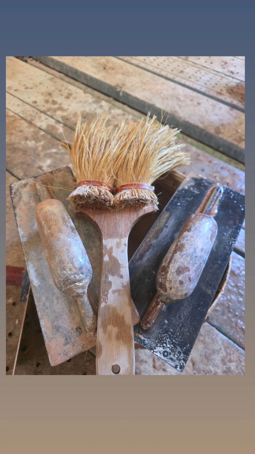 Traditional plastering trowels and brush